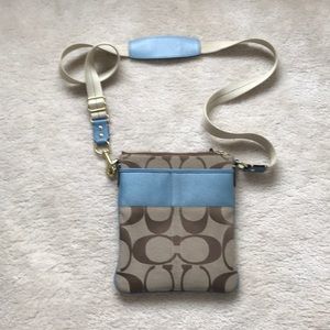 Coach cross body purse.